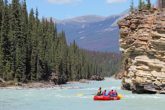 Athabasca Canyon Run Family Rafting: Class II Plus Rapids - Changing into neoprene before the river