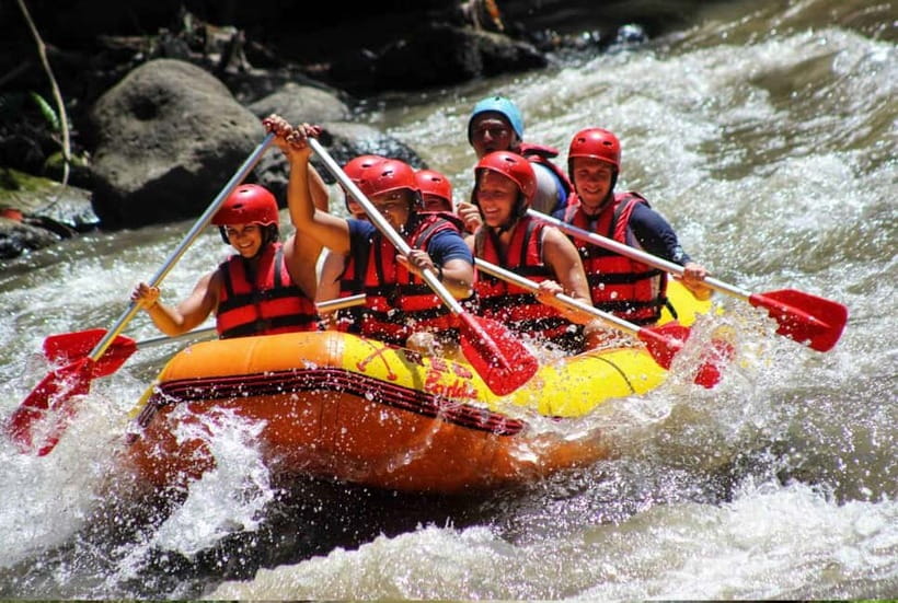Bali: Ayung River Whitewater Rafting Adventure with Lunch - Waterfalls and Balinese carvings along the route