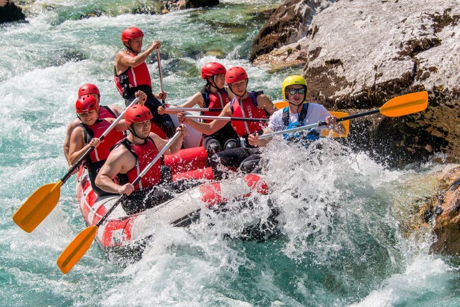 Bovec: Soca River Adventure Rafting With Photos Included - Paddling through the more active section