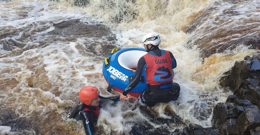 Bowlees: Guided White Water Tubing Adventure - Getting fitted for the water