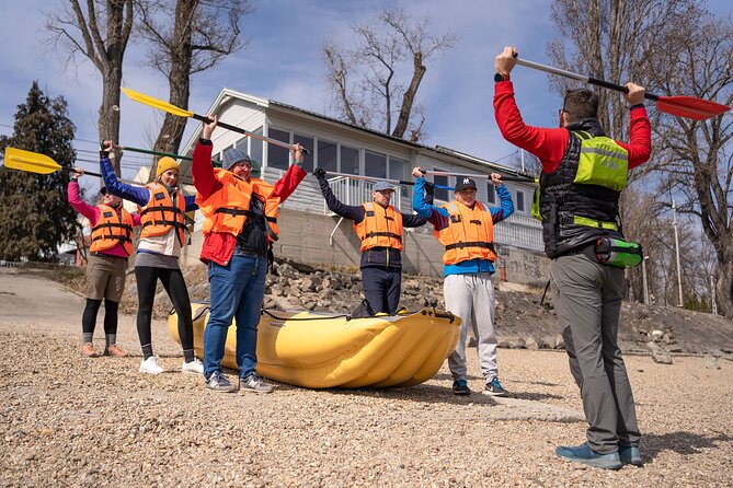 Budapest Rafting - Sunset Cruise - Learning the paddle before leaving shore