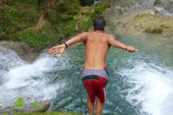 Dunn's River Falls, Blue Hole, Bamboo Rafting, Horseback Combo - Climbing Dunn’s River Falls in 90 minutes