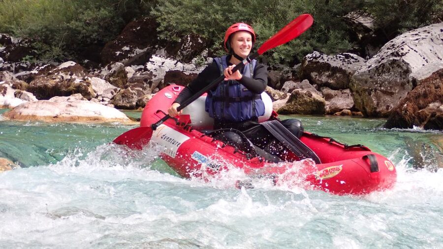 From Bovec: Whitewater kayaking on the Soča River - Taking on class III water in an inflatable kayak