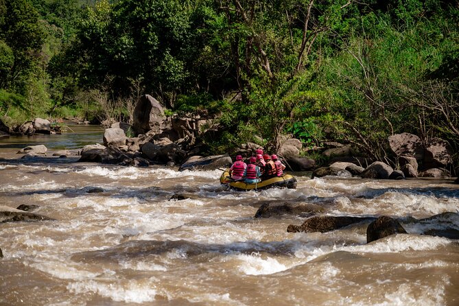 Half Day Visit and Whitewater Rafting Adventure - Changing into traditional cloth at Smile Elephant Chiang Mai