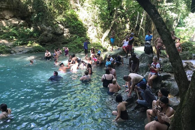 Horseback Ride, Blue Hole, Secret Falls, River Rafting & Tubing - Floating the White River through the rainforest
