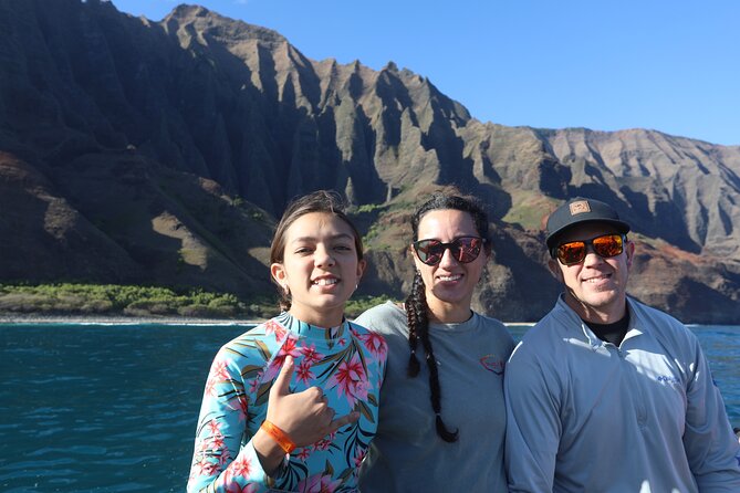 Nā Pali Coast Zodiac Raft Sea Caves Expedition on Kauai - The Kalalau Trail from an offshore viewpoint