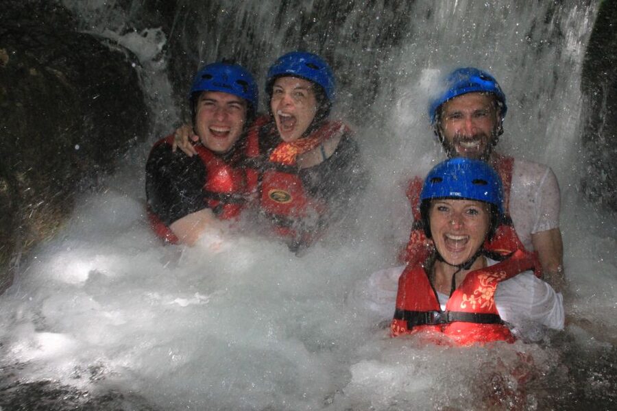 Split: Cetina River Rafting with Cliff Jumping and Cave Tour - Swimming Under a Spring Waterfall