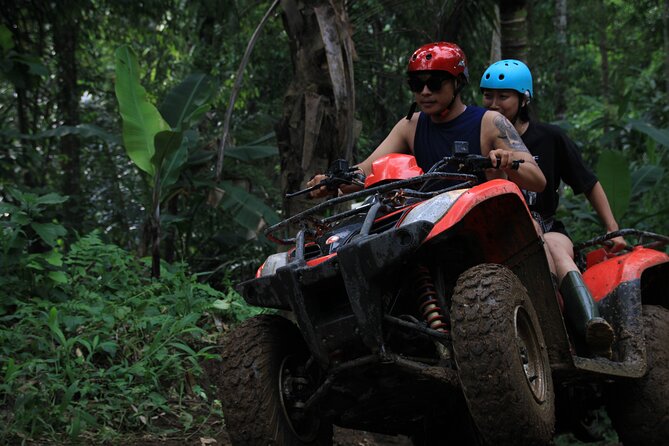 Ubud ATV Quad Bike with Ayung River Rafting Experience - ATV riding through tunnels, waterfalls, and rice fields
