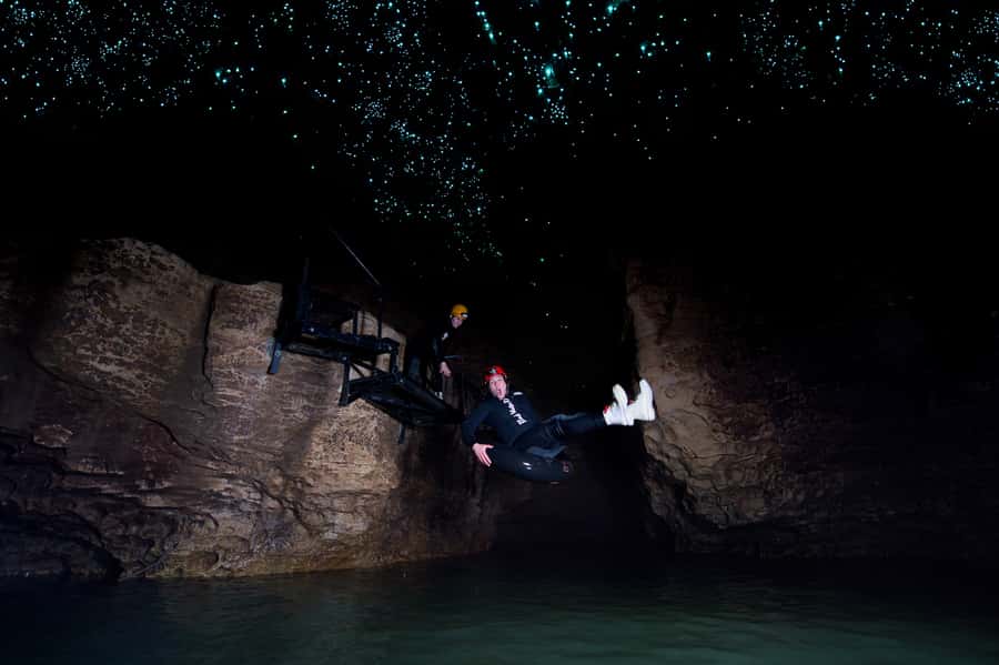 Waitomo Caves: Labyrinth Black Water Rafting Experience - Waterfalls, rock slides, and the active middle section